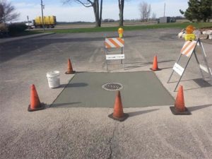 completed parking lot drain repair